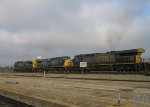 Three different GE models lead a train southbound